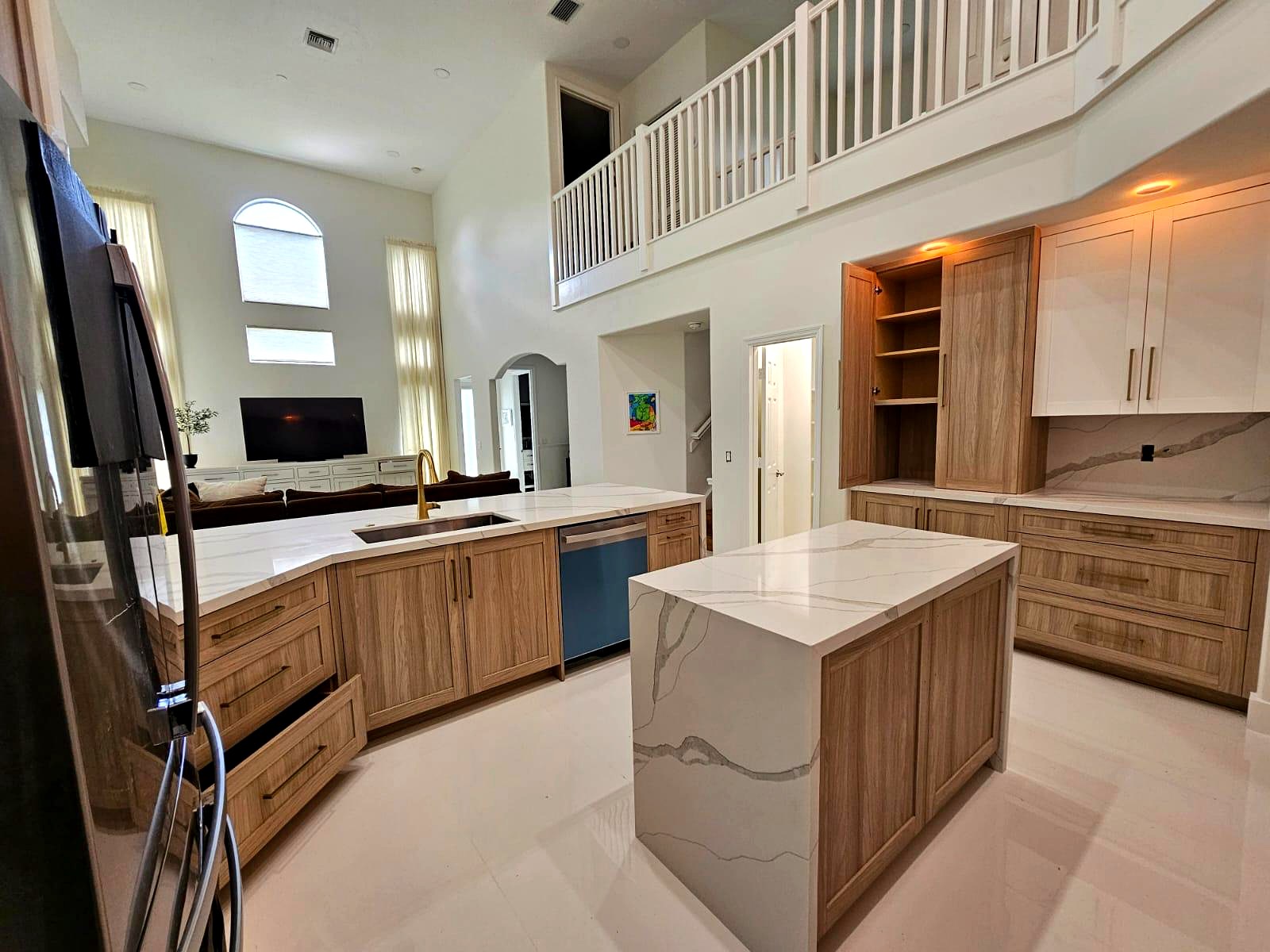 Custom kitchen remodel with marble island and two-story great room, Pembroke Pines